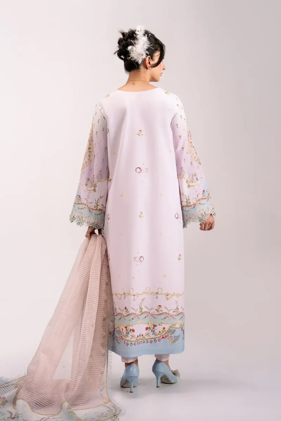QSL-07 Noa ivory embellished Charmeuse silk suit with handmade embroidery, Rocket Net dupatta and raw silk trouser.