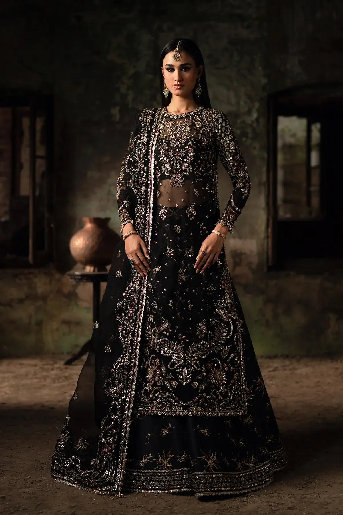 Pakistani black organza sharara outfit for Eid and formal wear.