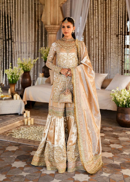 RESHAM – Gold bridal gharara suit in tissue with embroidery and dupatta. Stitched Pakistani wedding outfit online at Pakistanimoda.
