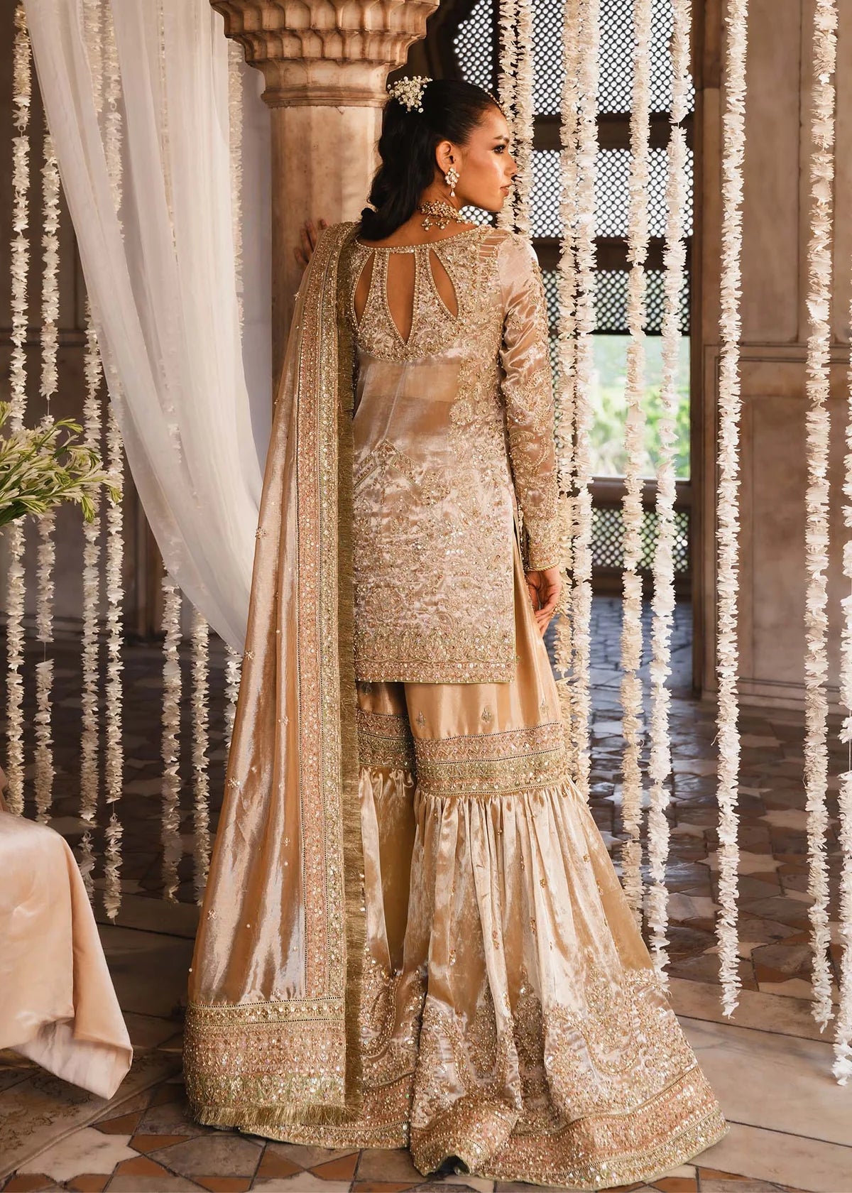 RESHAM – Gold bridal gharara suit in tissue with embroidery and dupatta. Stitched Pakistani wedding outfit online at Pakistanimoda.