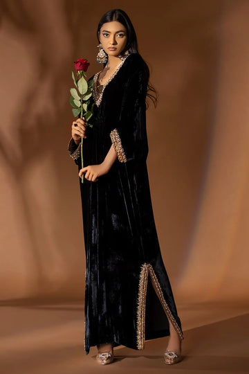 Black velvet kaftan with matching gold jamawar pants for formal wear
