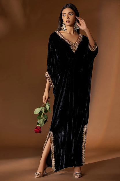 Black velvet kaftan with matching gold jamawar pants for formal wear