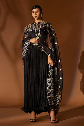 Black pleated silk outfit with gold embroidered organza dupatta – festive formal wear for women at Pakistanimoda