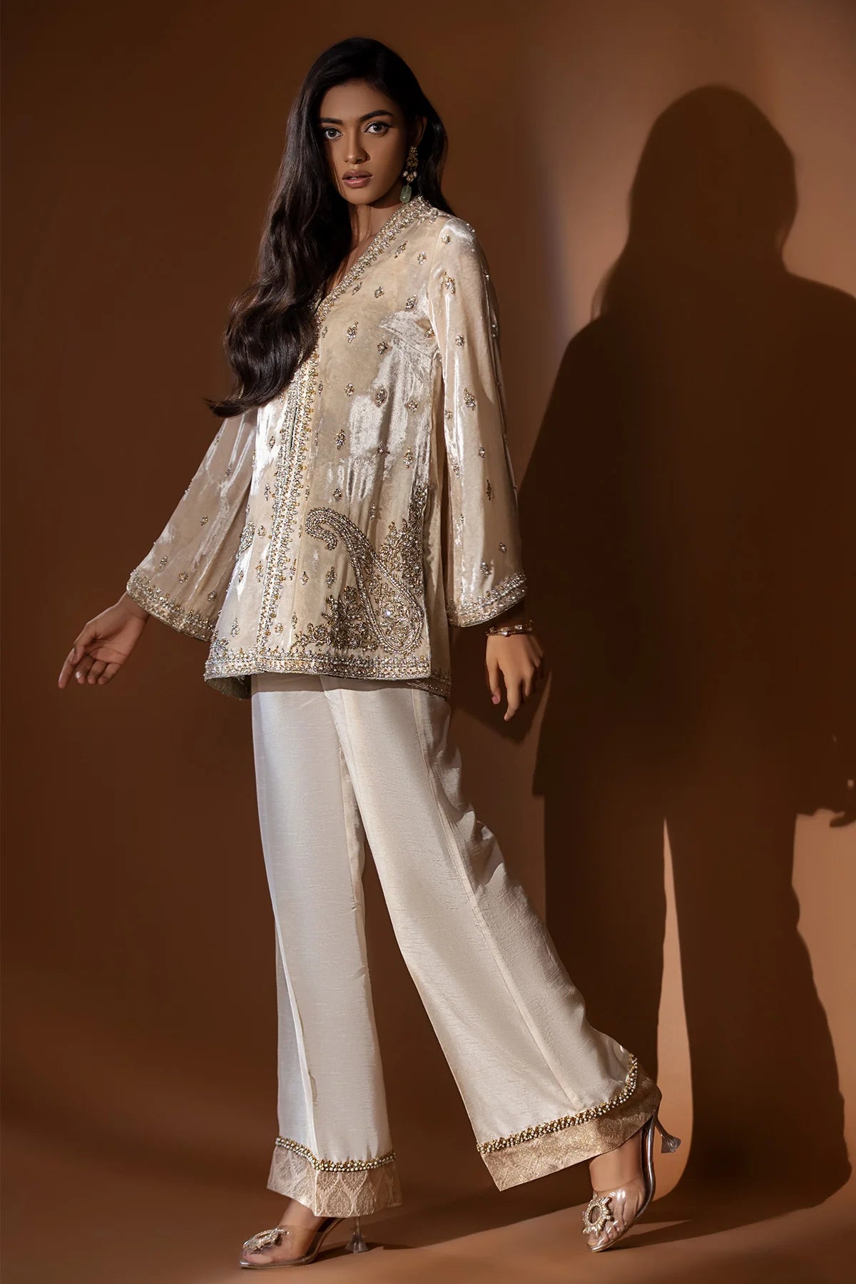 Beige velvet jacket with silver gold handwork and jamawar finish, paired with raw silk blouse, pants, and matching organza dupatta – formal wear 2025.
