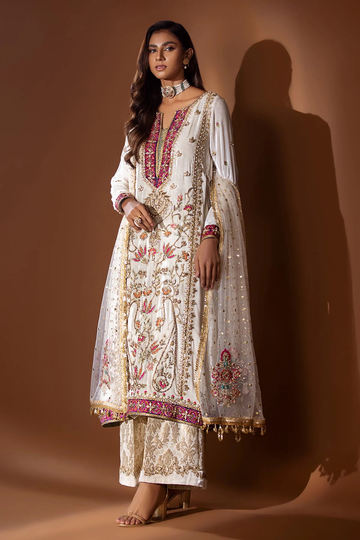 Off-white velvet shirt with resham, tilla, gota & block print, jamawar pants with gota, and matching organza dupatta – perfect for weddings 2025.

