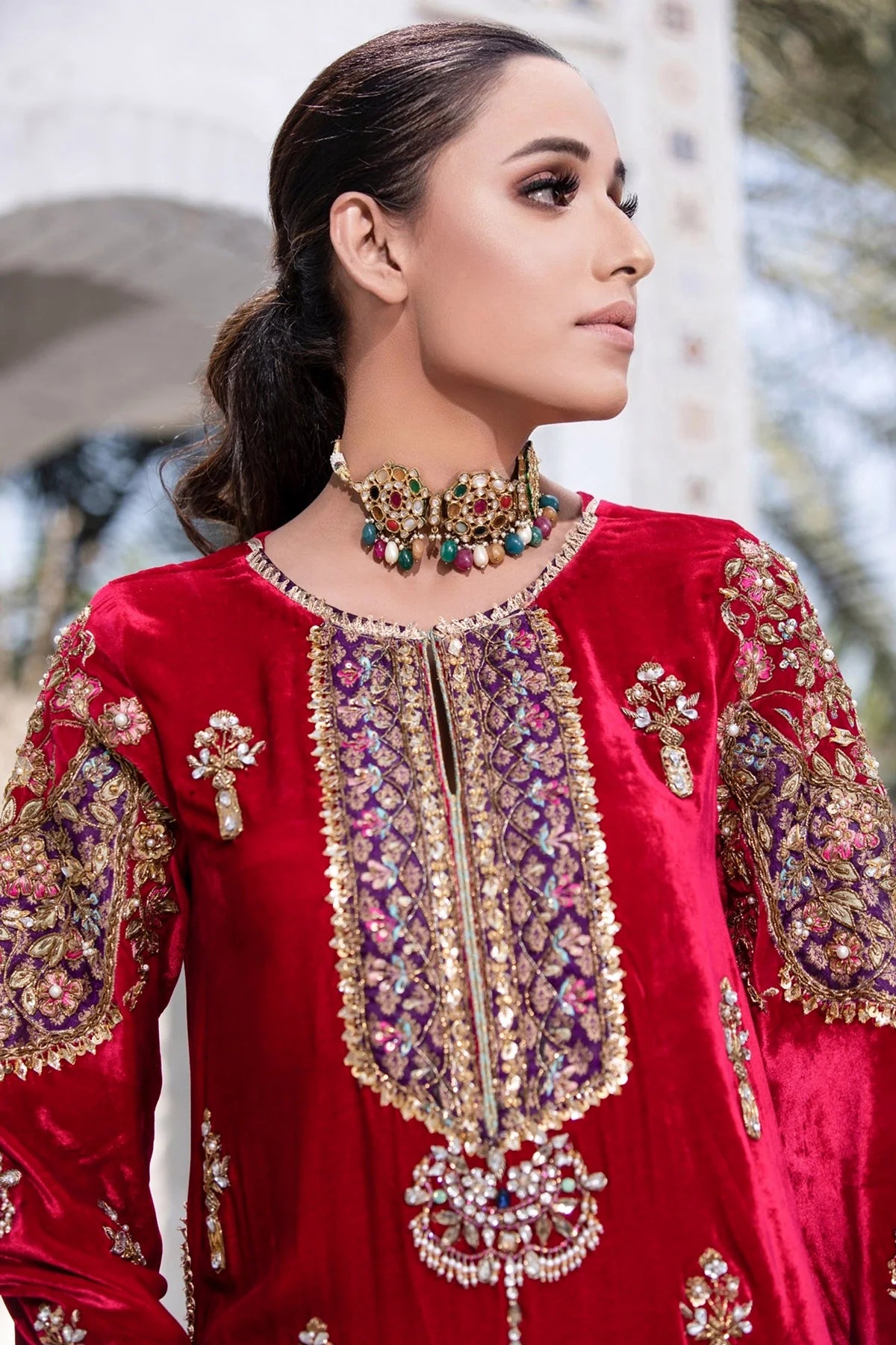 Crimson velvet kurta with plum jamawar, floral embroidery, handworked pearls & crystals, silk pants with embellished hem & organza dupatta – 2025 festive wear.