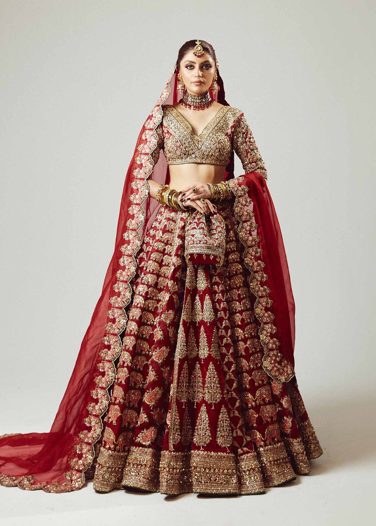 Raaqs- Pakistani Red pure Organza Lehenga Choli ensemble