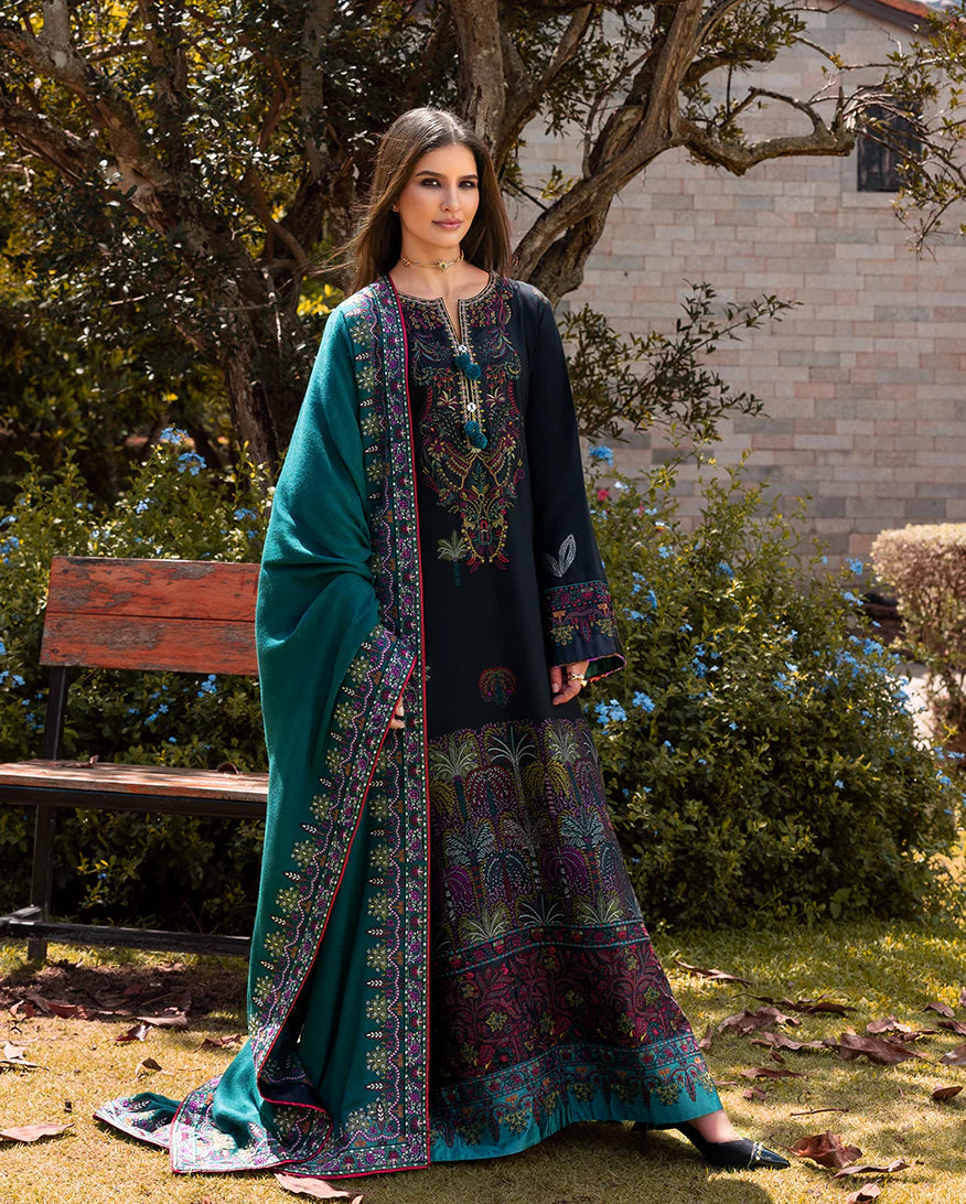 Model wearing Mushq Radiant Solitude black viscose embroidered winter outfit with teal shawl – Winter Broadway 2025