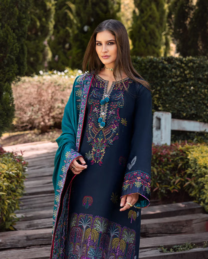 Model wearing Mushq Radiant Solitude black viscose embroidered winter outfit with teal shawl – Winter Broadway 2025
