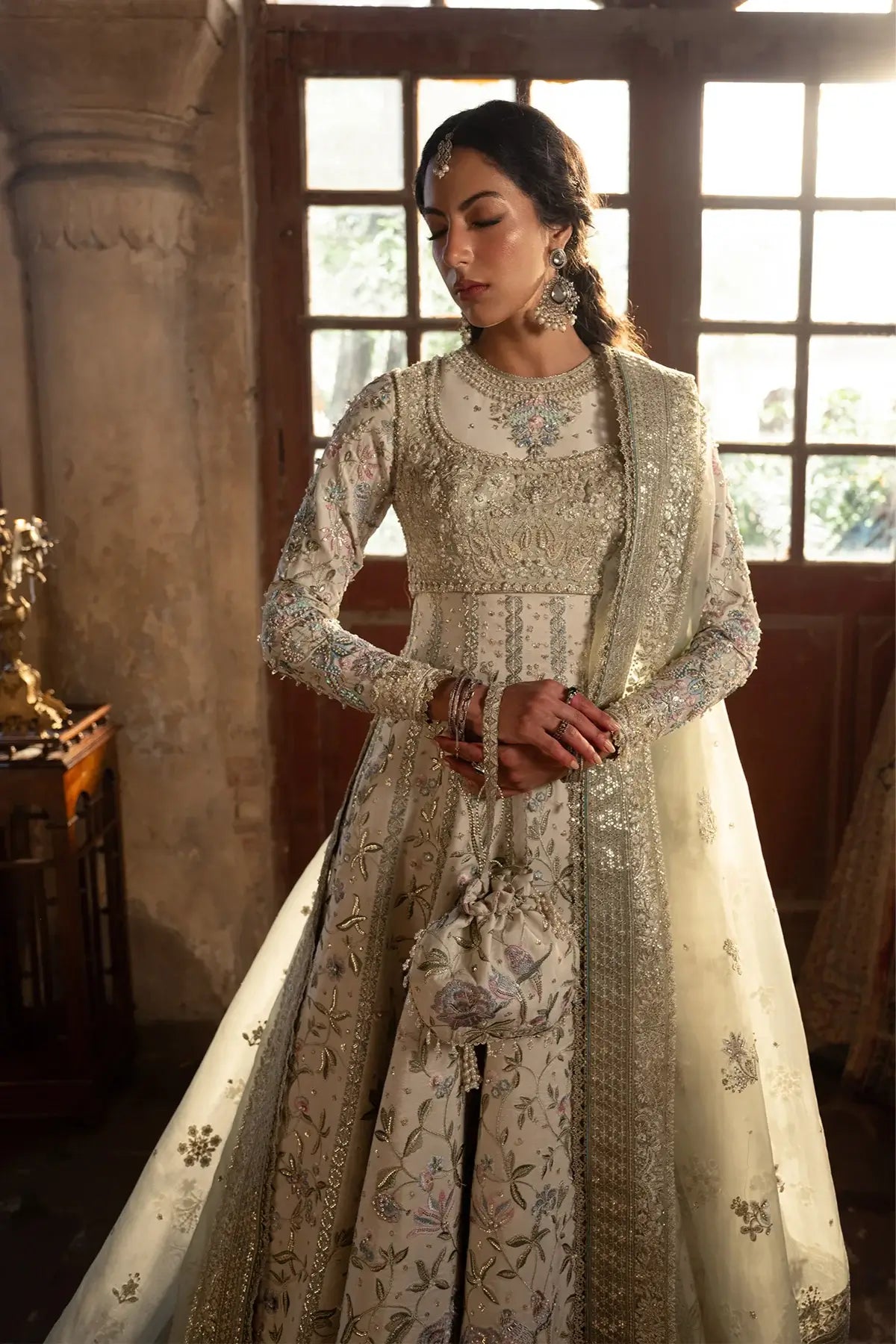 Raha Vasl 26 ivory handworked Pakistani stitched wedding pishwas with embellished silk lehenga and embroidered organza dupatta