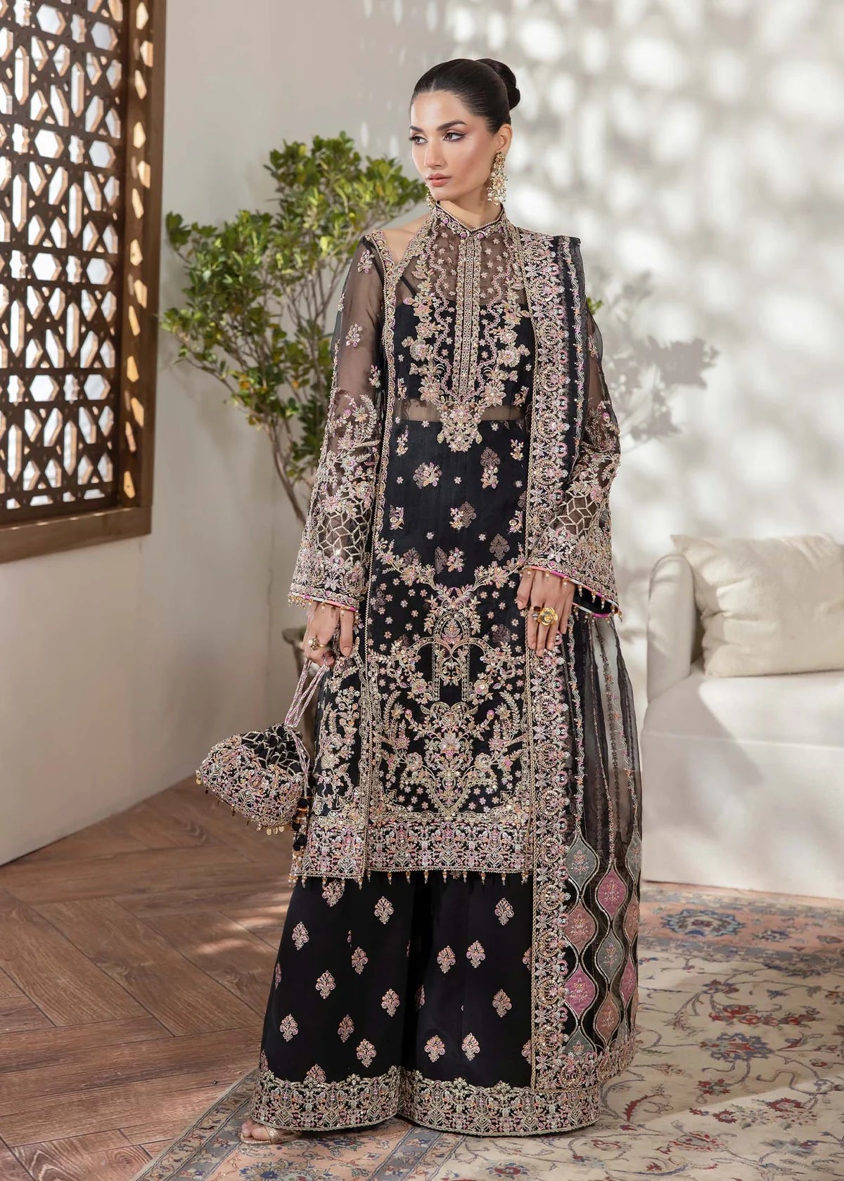 Black organza Pakistani suit with embellished shirt, block-printed flared pants, and laser-cut dupatta – perfect for Eid and party wear in USA, UK, and Canada.