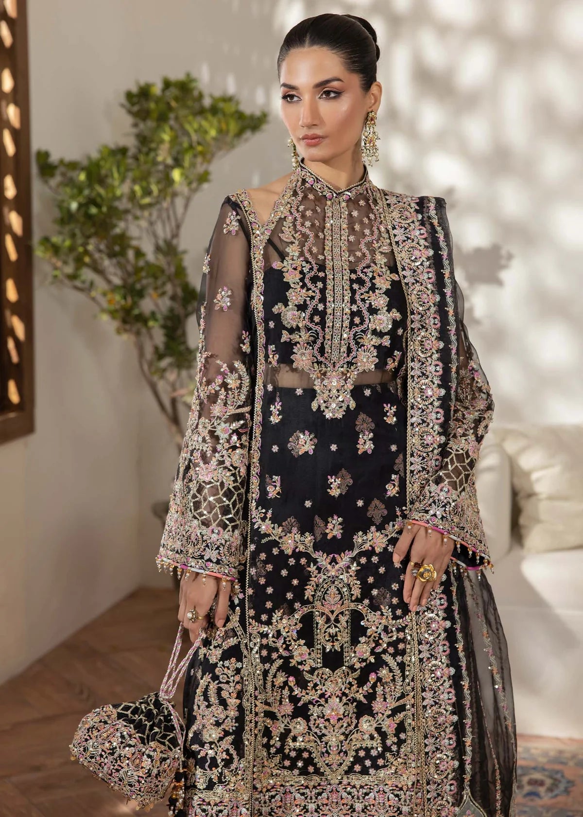 Black organza Pakistani suit with embellished shirt, block-printed flared pants, and laser-cut dupatta – perfect for Eid and party wear in USA, UK, and Canada.