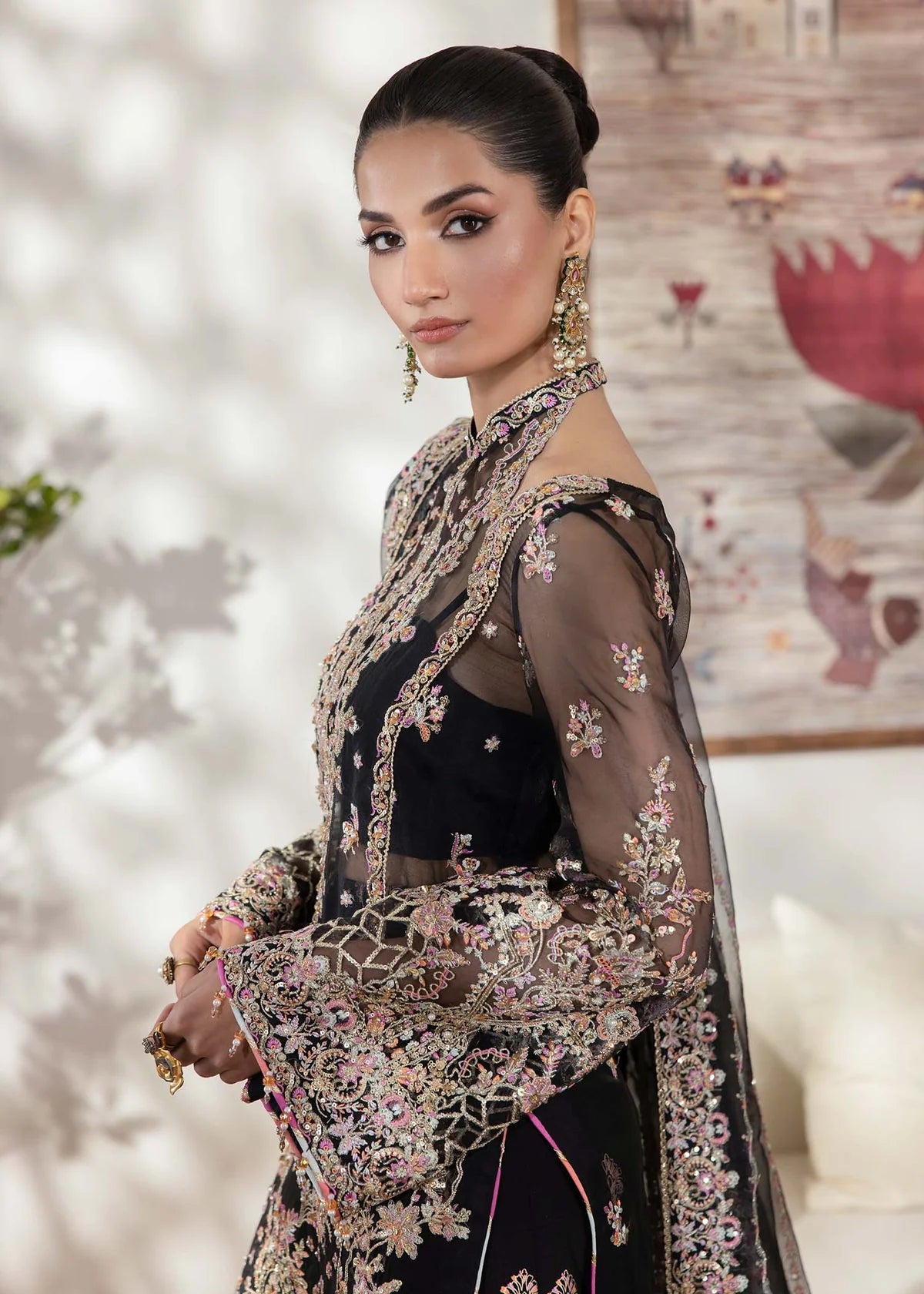 Black organza Pakistani suit with embellished shirt, block-printed flared pants, and laser-cut dupatta – perfect for Eid and party wear in USA, UK, and Canada.