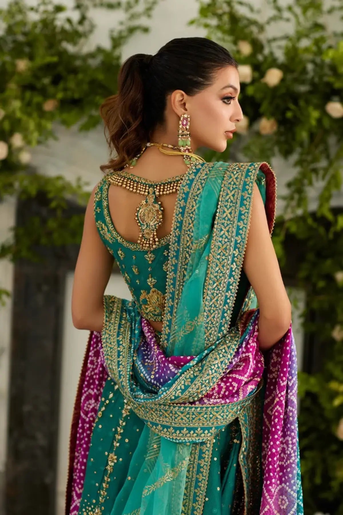 Reyna Teal Gold Embroidered Silk Net Lehenga Choli with Ornate Borders, Contrasting Chunri Dupatta and Embellished Pouch