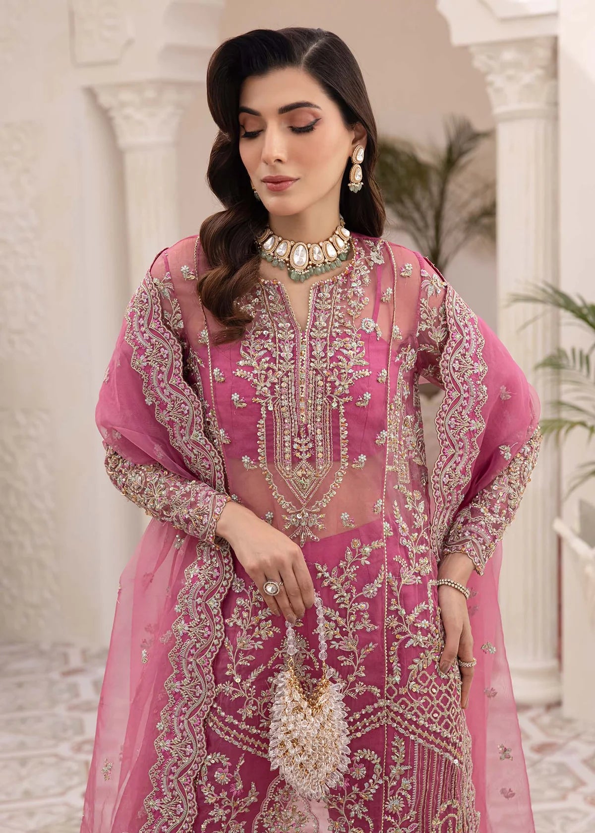 Mauve organza Pakistani dress with pearls, floral embroidery, net dupatta, and wide-leg culottes – ideal for formal events in USA, UK, and Canada.