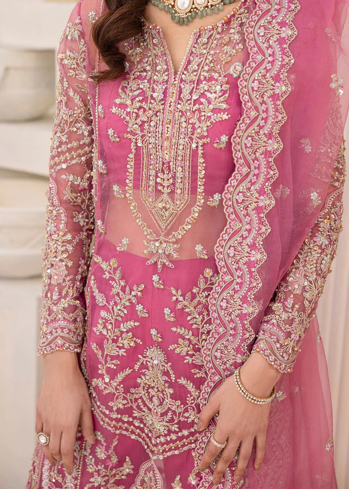 Mauve organza Pakistani dress with pearls, floral embroidery, net dupatta, and wide-leg culottes – ideal for formal events in USA, UK, and Canada.