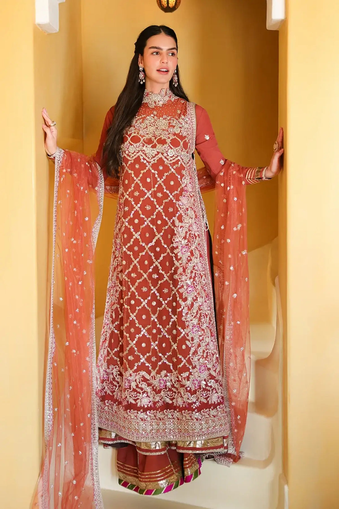 Rose Romance rust orange hand embellished chiffon festive stitched suit with embroidered raw silk sleeves, raw silk trouser and sequinned net dupatta