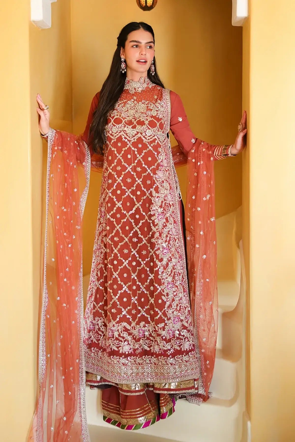 Rose Romance rust orange hand embellished chiffon festive stitched suit with embroidered raw silk sleeves, raw silk trouser and sequinned net dupatta