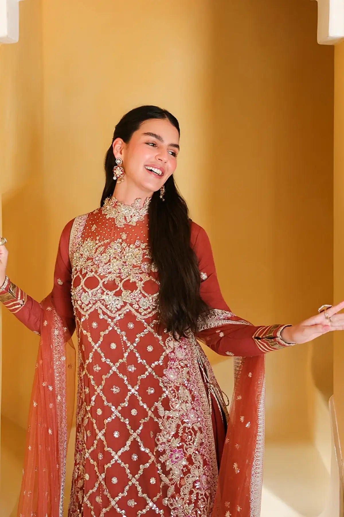 Rose Romance rust orange hand embellished chiffon festive stitched suit with embroidered raw silk sleeves, raw silk trouser and sequinned net dupatta