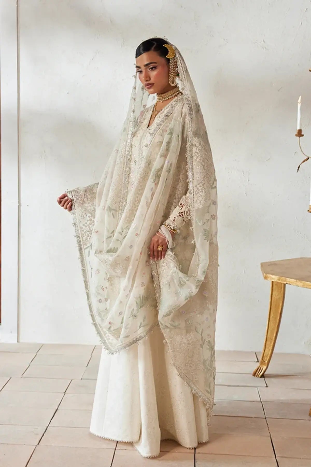 Rosha cloud white embroidered organza peplum sharara suit with multicolor floral resham work, raw silk sharara and embellished dupatta