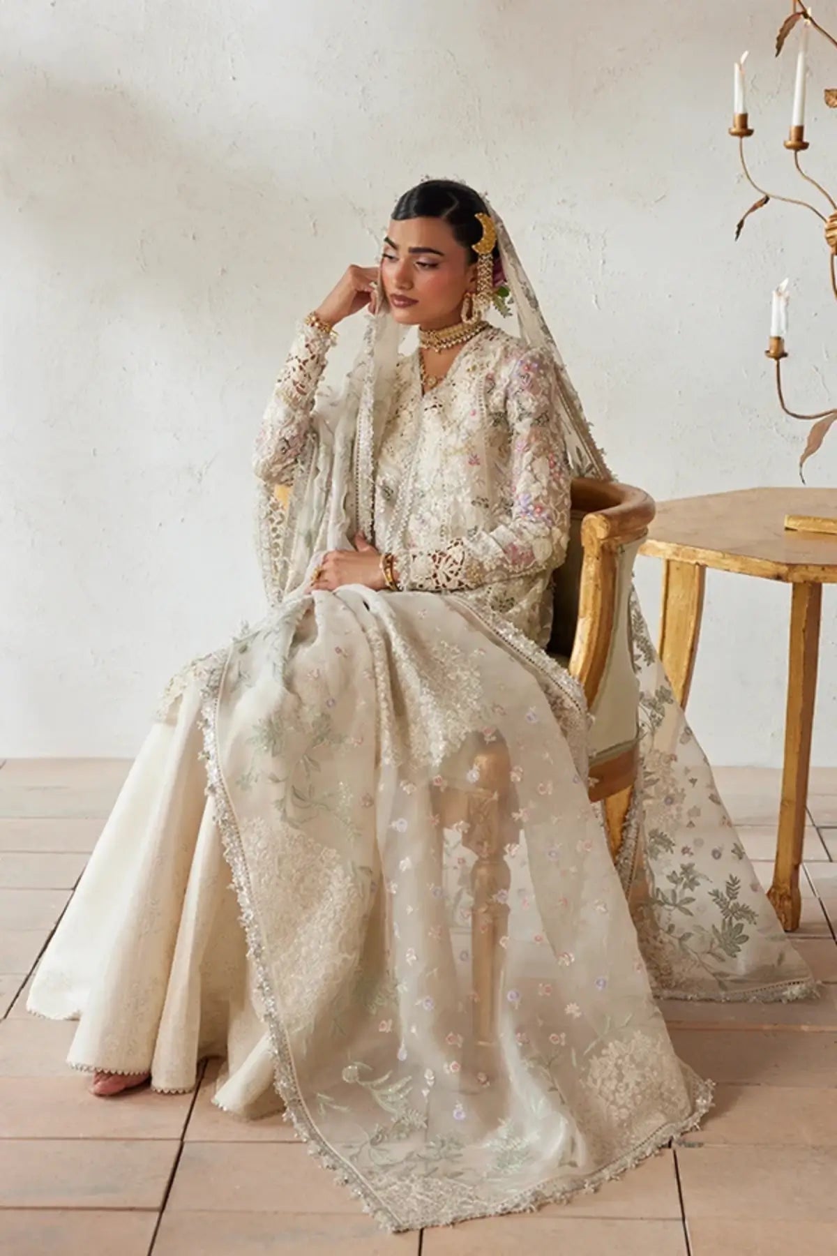 Rosha cloud white embroidered organza peplum sharara suit with multicolor floral resham work, raw silk sharara and embellished dupatta