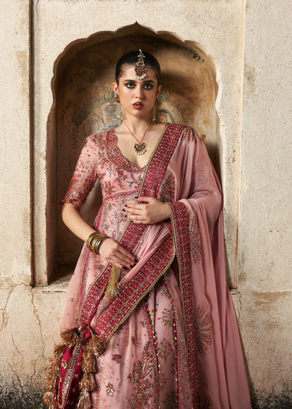Model wearing Roshanara Rose Pink Organza Embroidered Pishwas with Lehenga and Chiffon Dupatta – Hussain Rehar Massarat Festive 2025 Collection.