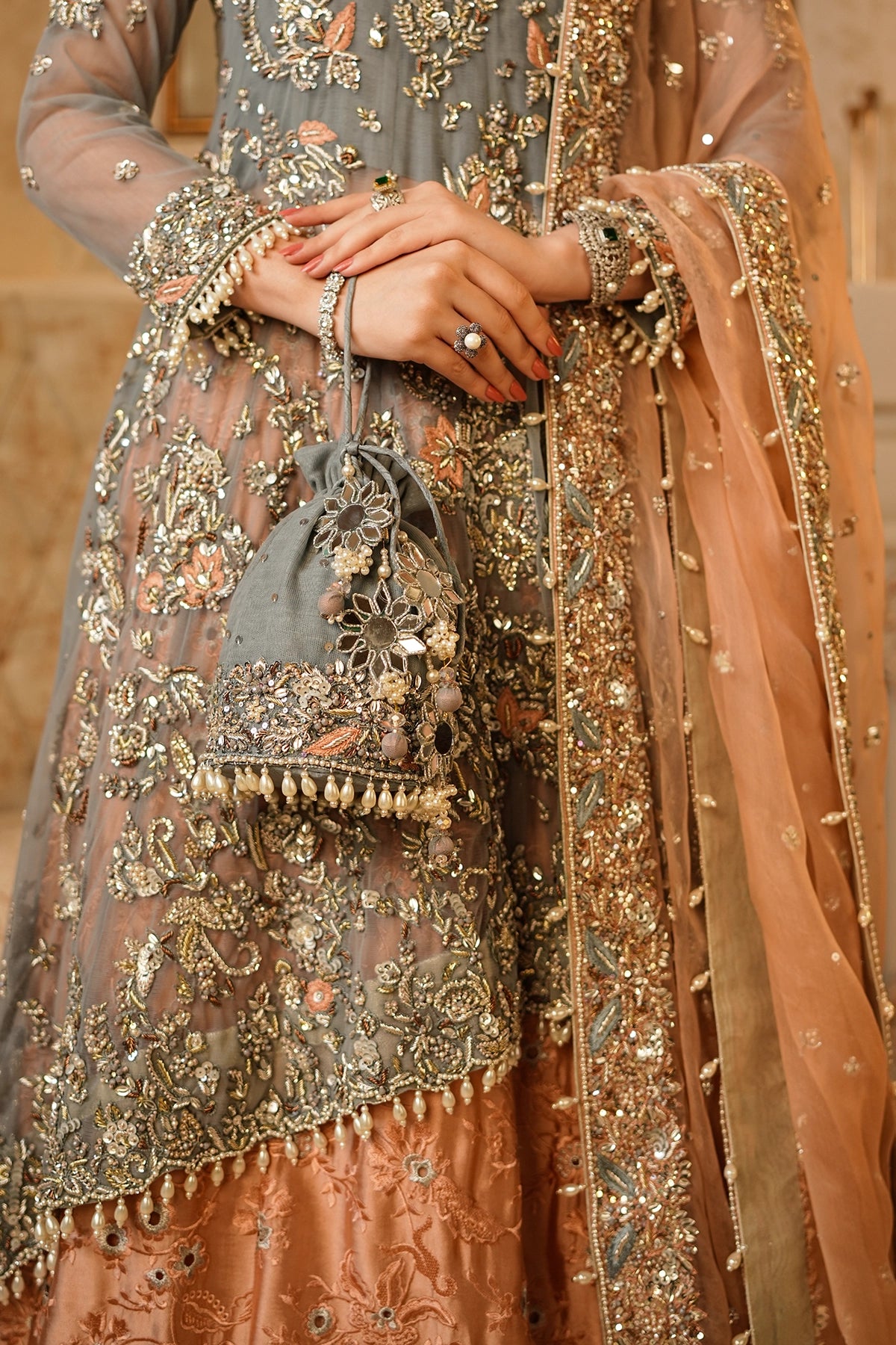 Roshaneh grey embellished net wedding dress with peach sheesha silk sharara and organza dupatta
