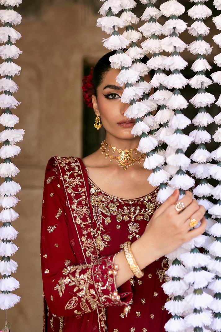 Rosmyn elegant deep maroon chiffon embroidered three-piece party wear set with raw silk trouser and chiffon dupatta by Emaan Adeel, available at Pakistanimoda.com.