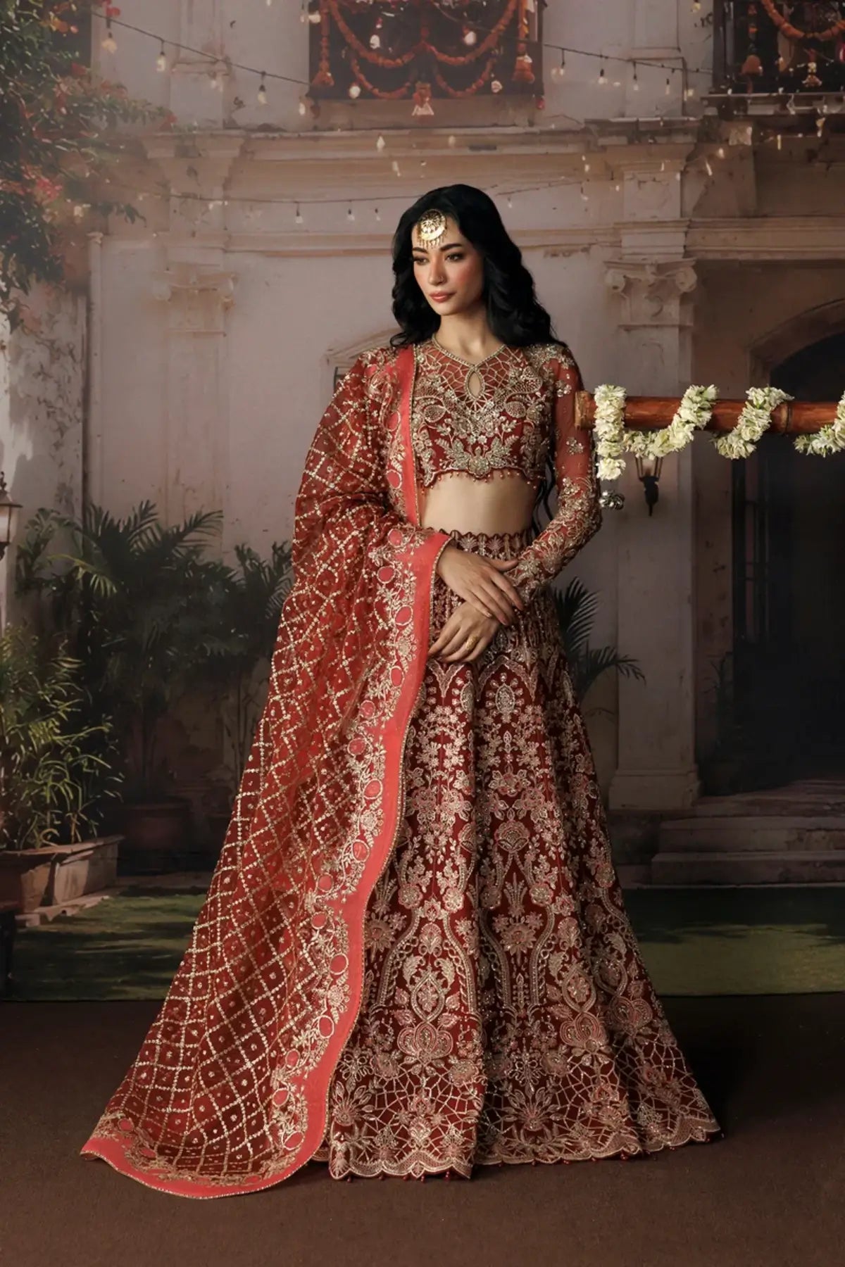 Rukhsan crimson red embroidered organza stitched wedding lehenga with detailed silver embroidery and elegant organza dupatta
