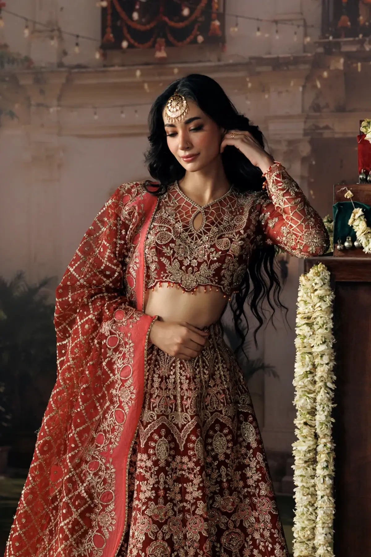 Rukhsan crimson red embroidered organza stitched wedding lehenga with detailed silver embroidery and elegant organza dupatta