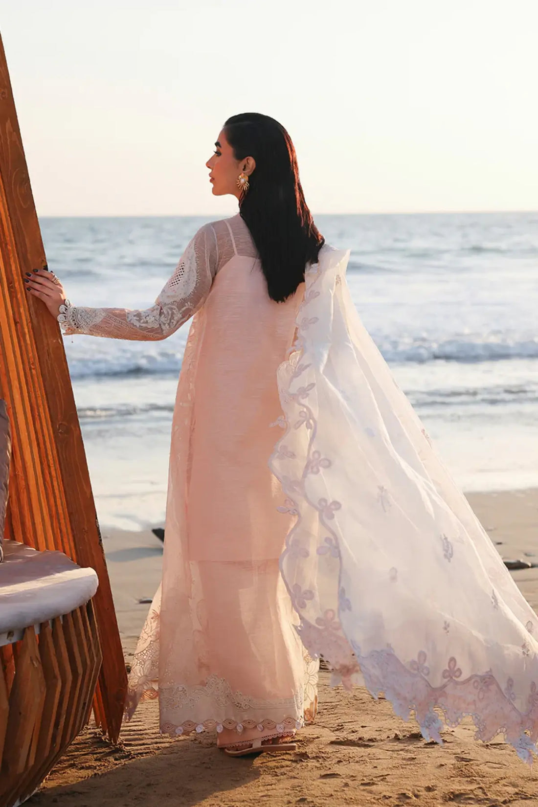 Peach stitched jacquard 3PC suit SA-06 Mahur featuring laser cut panels and detailed dupatta by Qalamkar.