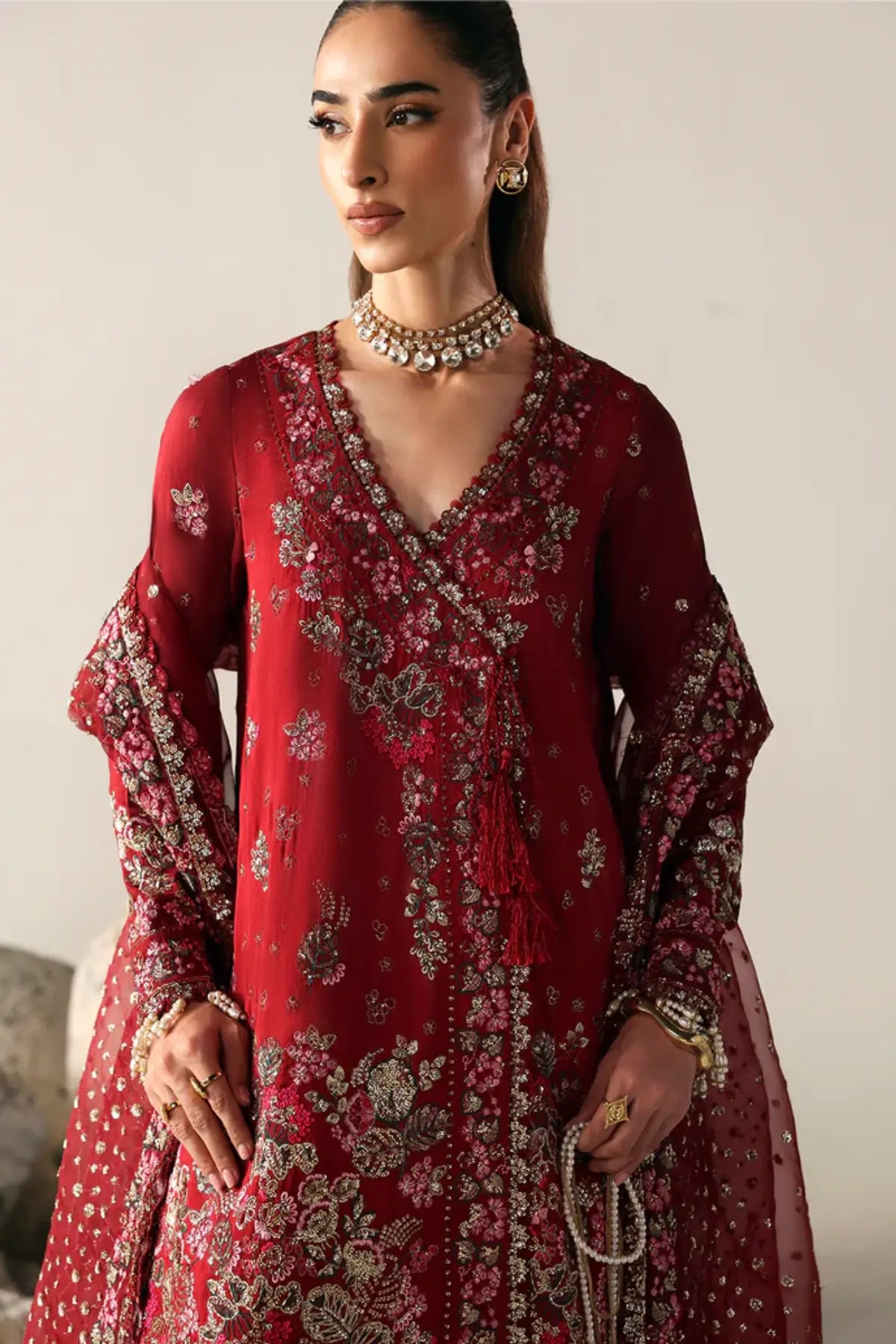 SERENITY BLOOM Emaan Adeel red stitched raw silk angrakha outfit with sharara Pakistanimoda.