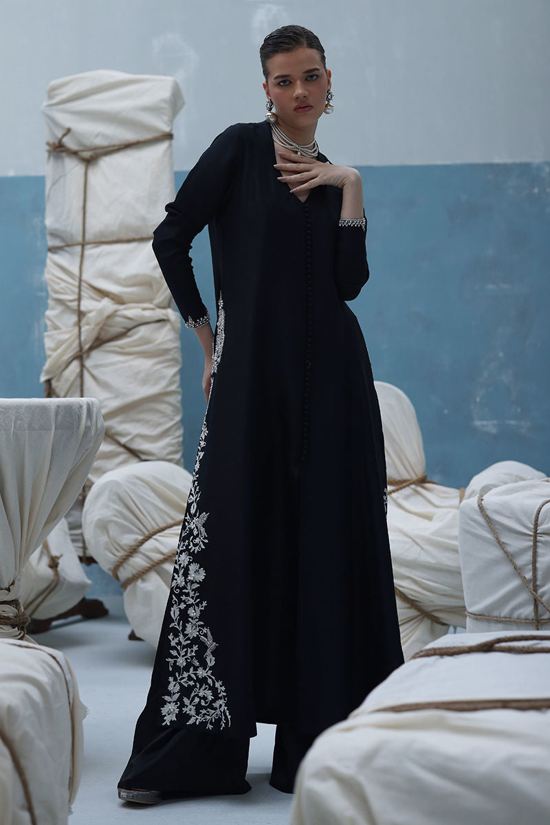 Ivory raw silk embroidered shirt with dabka, pearls, and tikki stones, paired with shimmer crepe culottes – formal Pakistani outfit for weddings and festive occasions.