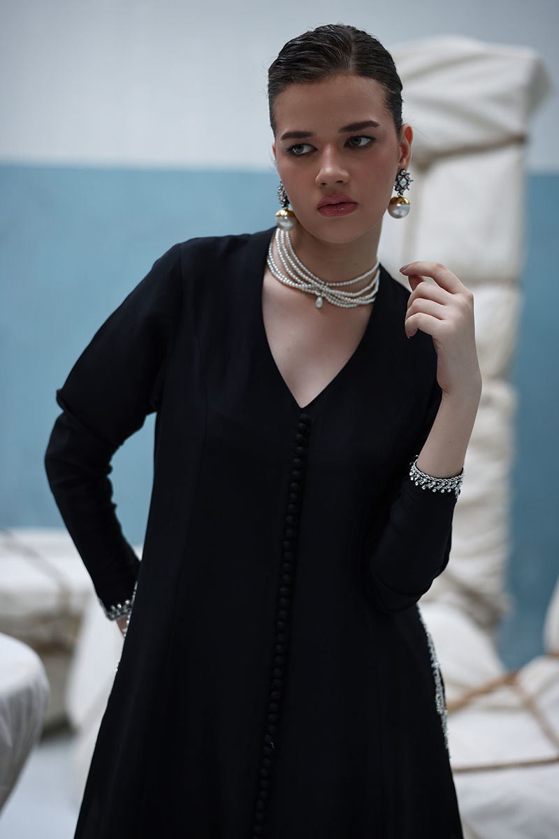 Ivory raw silk embroidered shirt with dabka, pearls, and tikki stones, paired with shimmer crepe culottes – formal Pakistani outfit for weddings and festive occasions.