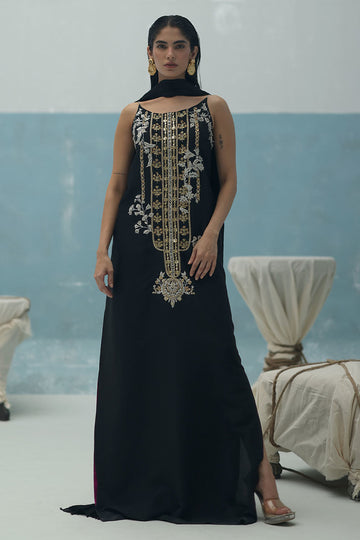 Black raw silk kaftan with gold and silver hand embroidery, paired with a crushed dupatta featuring crystal pallu – Pakistani formal outfit for weddings and Eid.