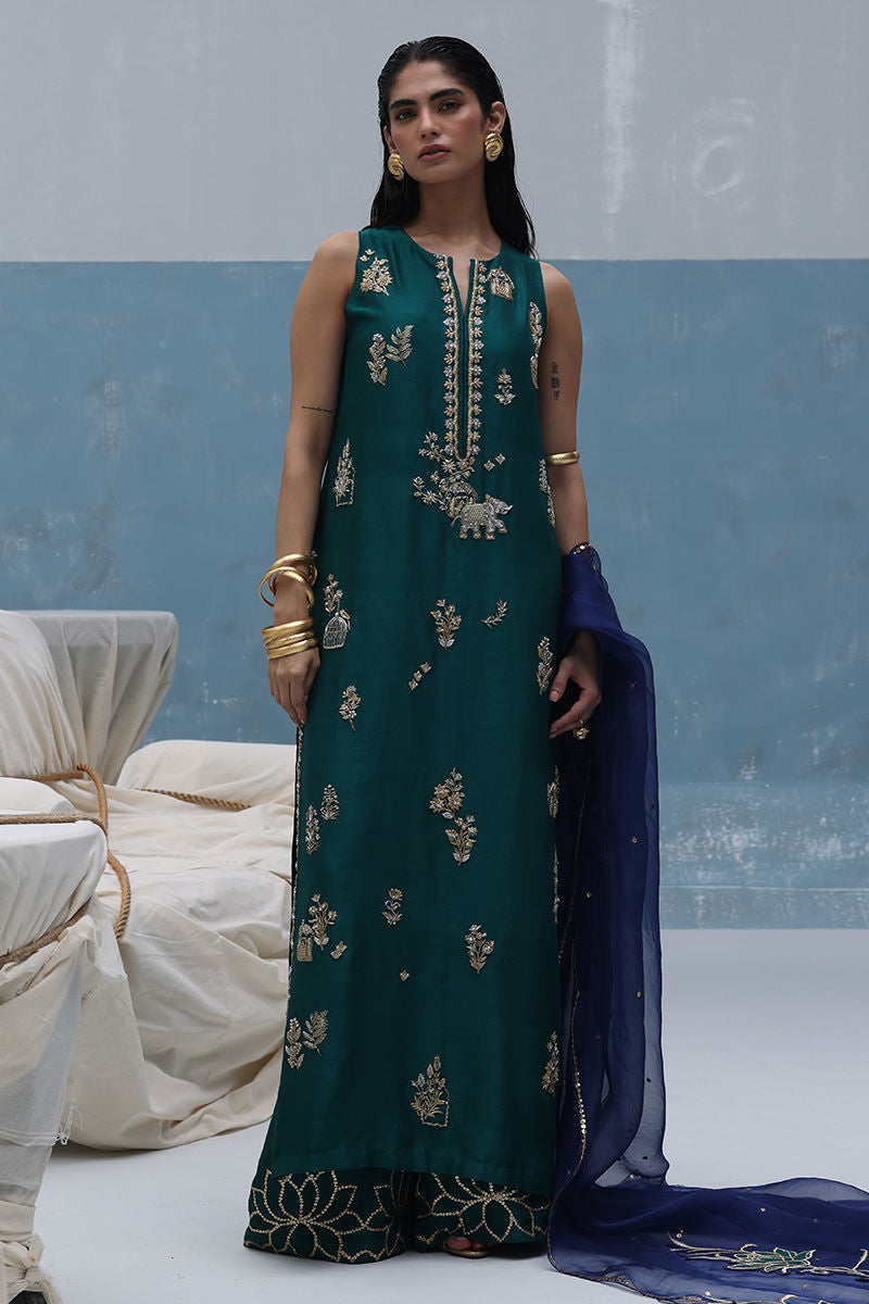 Antique green zardozi embroidered raw silk shirt with blue organza dupatta and embellished culottes – formal Pakistani outfit for women overseas.

