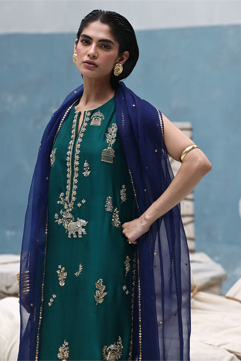Antique green zardozi embroidered raw silk shirt with blue organza dupatta and embellished culottes – formal Pakistani outfit for women overseas.

