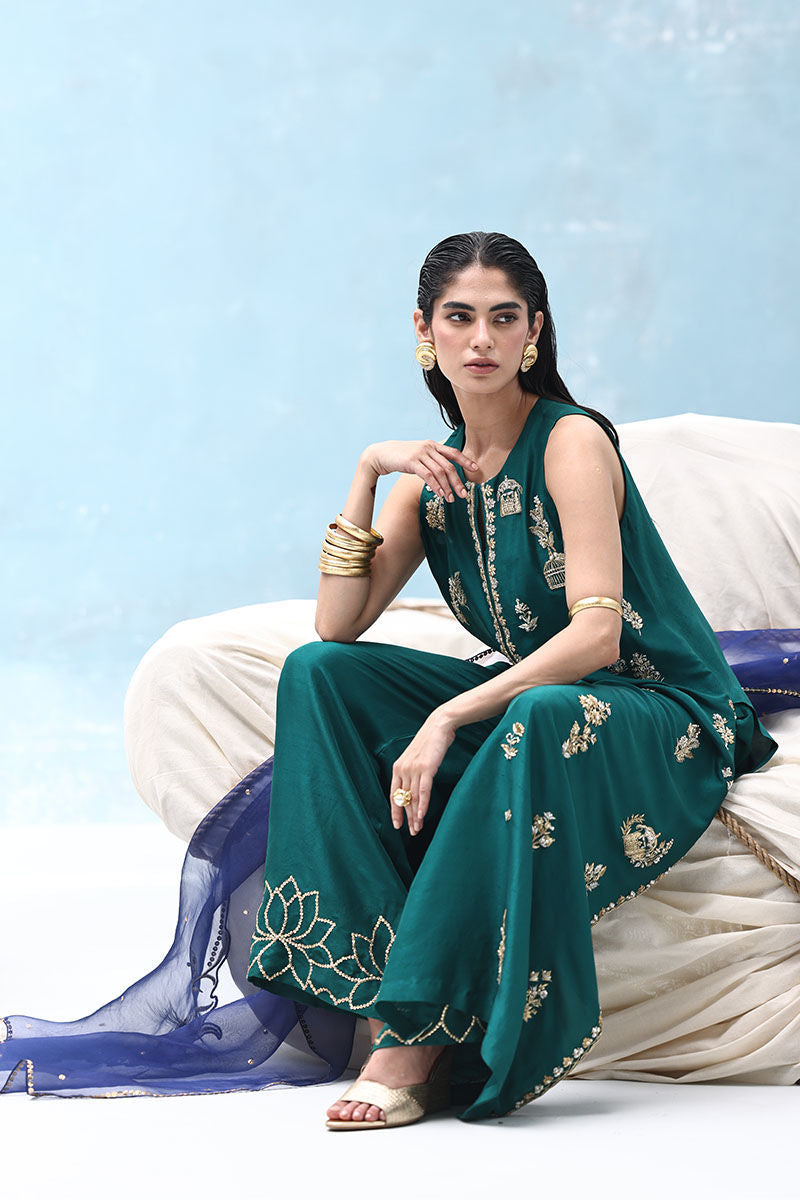 Antique green zardozi embroidered raw silk shirt with blue organza dupatta and embellished culottes – formal Pakistani outfit for women overseas.

