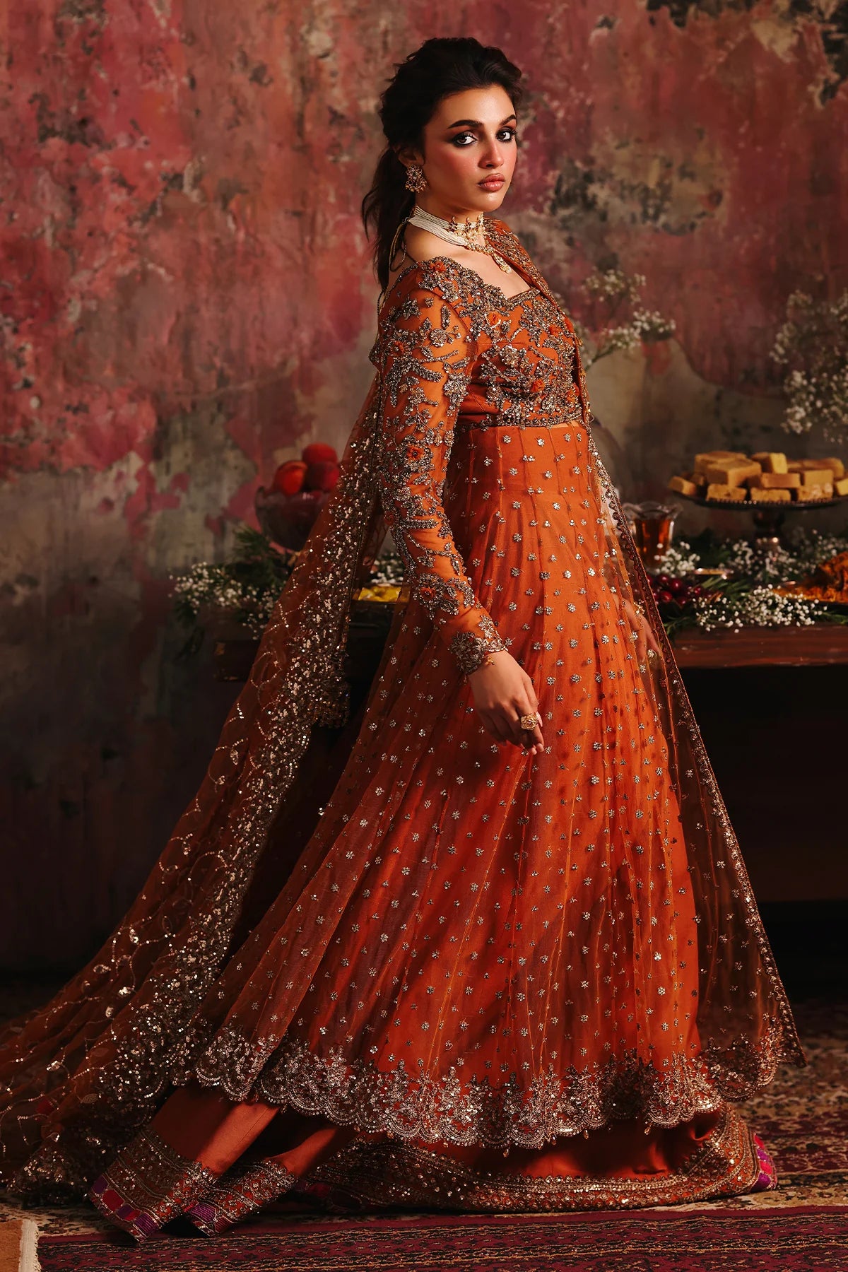 Charizma STM-5-01 Rust Net Pishwas with Hand Embroidery, Sharara & Sequin Dupatta for Reception – Pakistanimoda