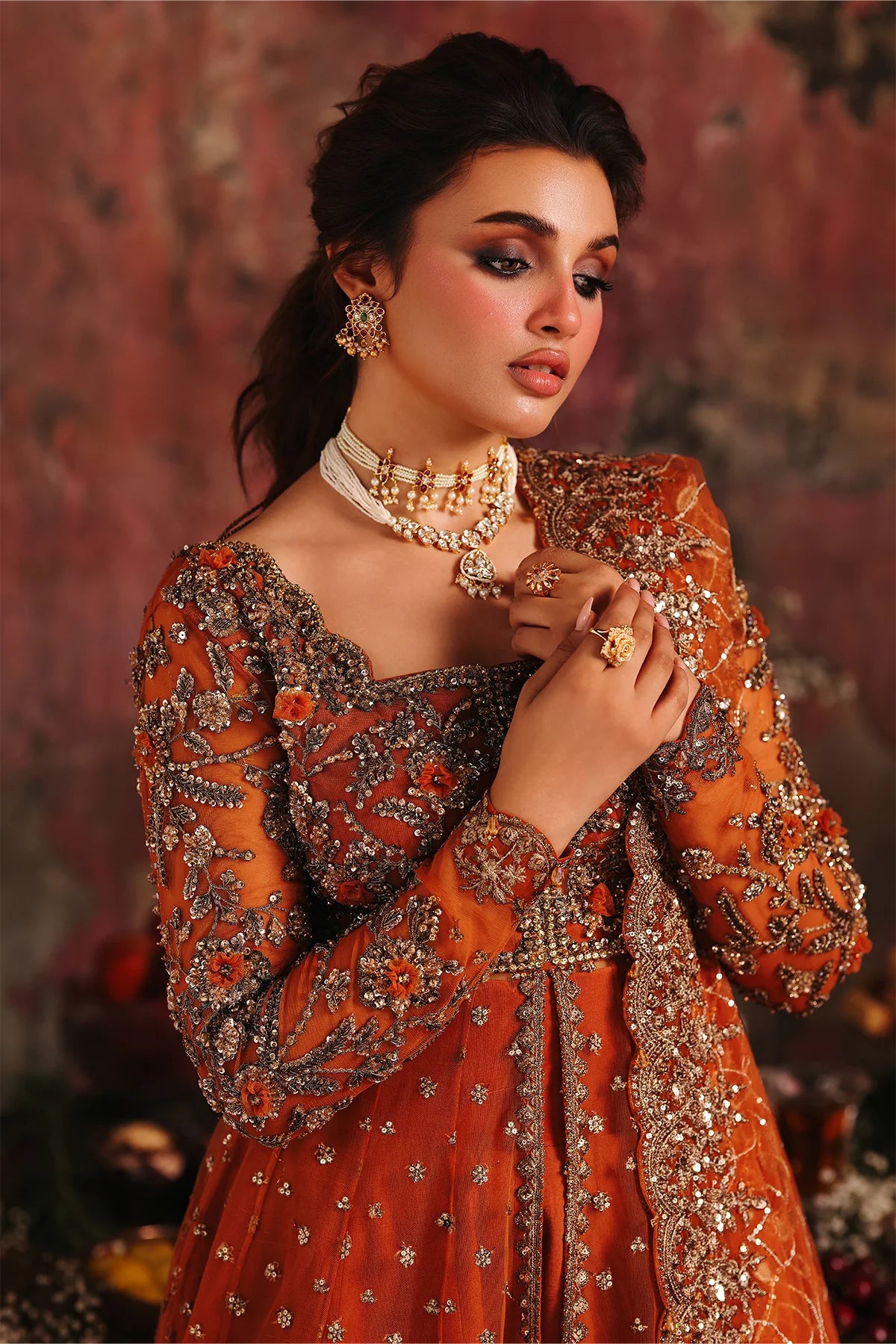 Charizma STM-5-01 Rust Net Pishwas with Hand Embroidery, Sharara & Sequin Dupatta for Reception – Pakistanimoda