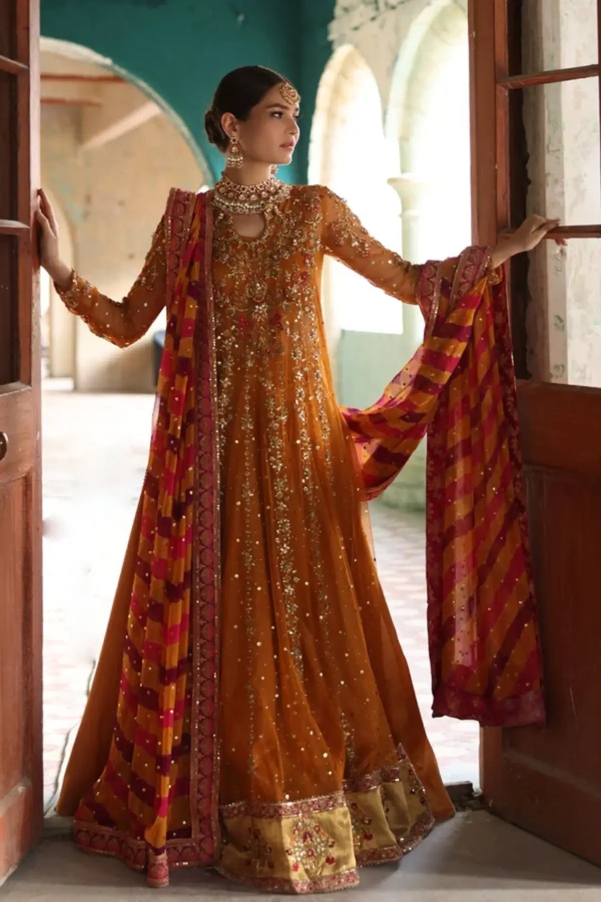 Safa Saffron Net Kalidar Wedding Pishwas with Shimmering Embroidery, Lame Tissue Lehenga and Contrasting Pink Orange Chiffon Dupatta