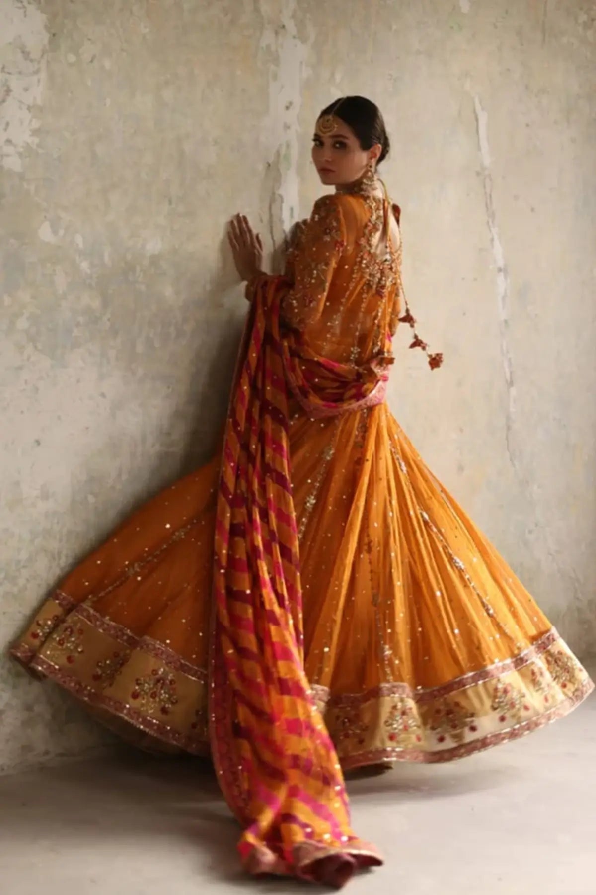 Safa Saffron Net Kalidar Wedding Pishwas with Shimmering Embroidery, Lame Tissue Lehenga and Contrasting Pink Orange Chiffon Dupatta