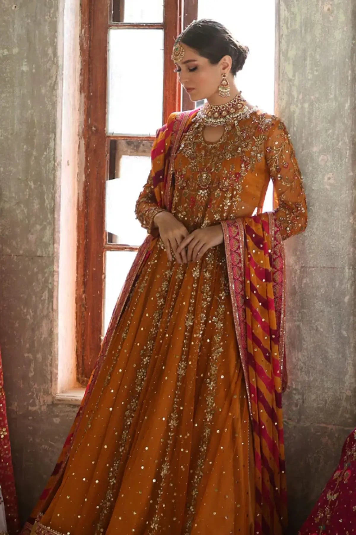 Safa Saffron Net Kalidar Wedding Pishwas with Shimmering Embroidery, Lame Tissue Lehenga and Contrasting Pink Orange Chiffon Dupatta