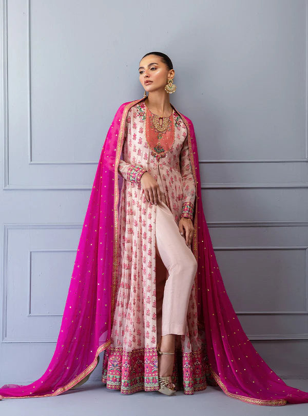 Safiye by Zainab Chottani ivory frock with pink block prints, hand embroidery, sequin chan, raw silk trousers, and pink chiffon dupatta for weddings.