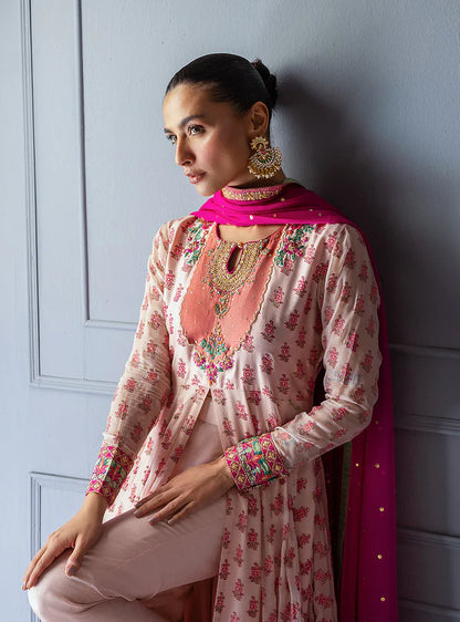 Safiye by Zainab Chottani ivory frock with pink block prints, hand embroidery, sequin chan, raw silk trousers, and pink chiffon dupatta for weddings.