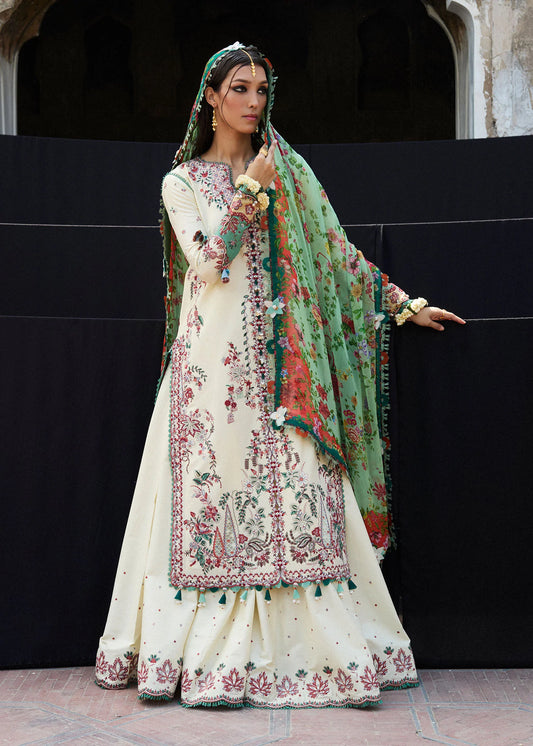 Sahil-Chic butter-yellow embroidered suit for festive occasions by-Hussain rehar