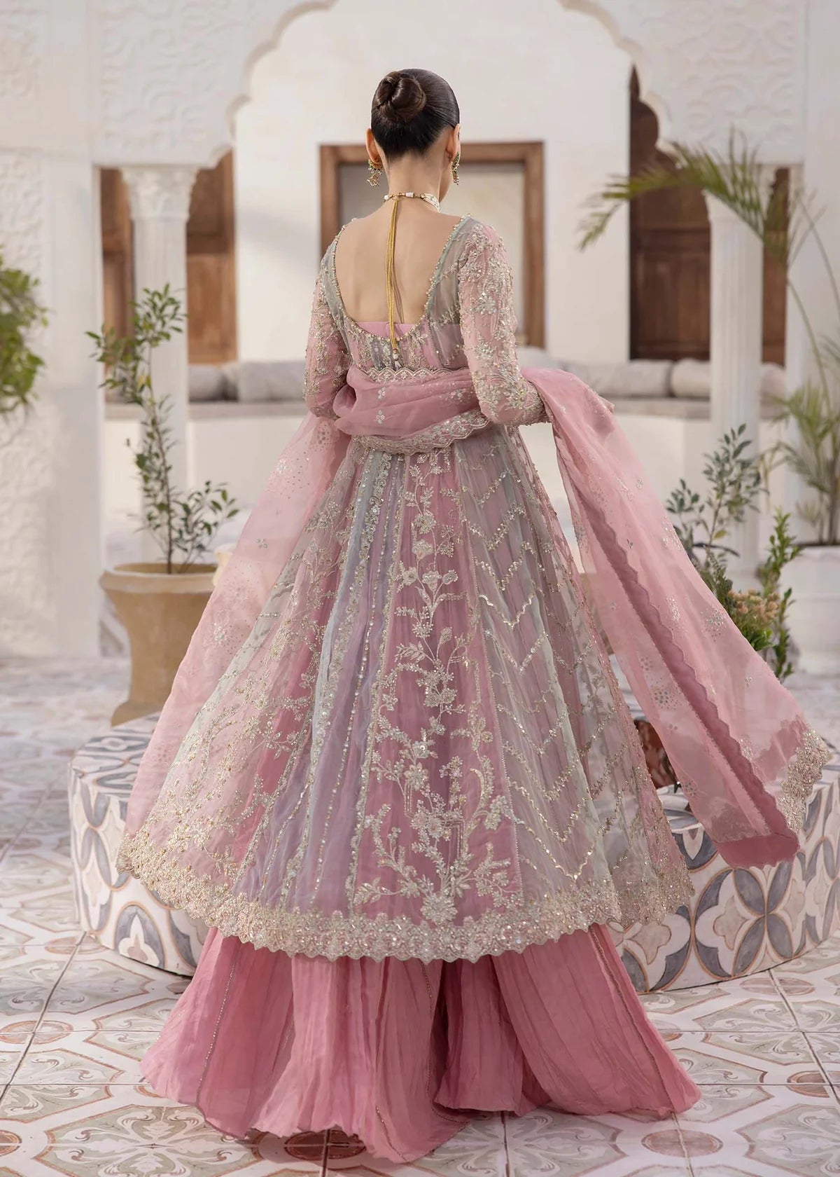 Multicolor embroidered pink pishwas with crushed trousers and sequin spray dupatta – ideal Pakistani Eid wear for USA, UK, and Canada.