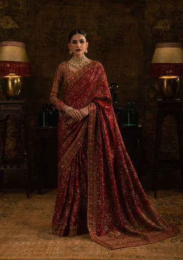 Aik Sari Edit ’25 Look 01 – Red bridal silk embroidered saree stitched with blouse & petticoat, luxury Pakistani designer outfit online.