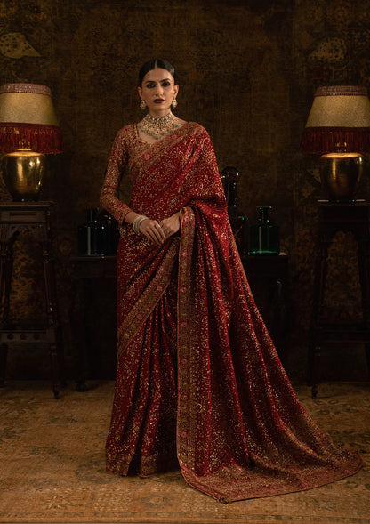 Aik Sari Edit ’25 Look 01 – Red bridal silk embroidered saree stitched with blouse & petticoat, luxury Pakistani designer outfit online.