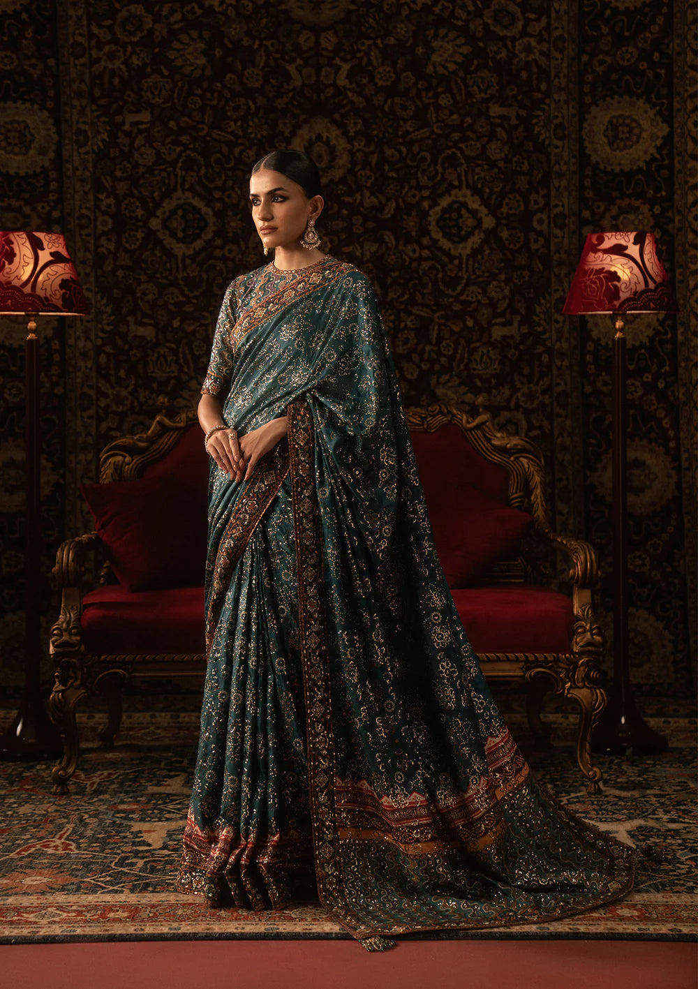 Aik Sari Edit ’25 Look 05 – Pakistani designer teal embroidered silk saree stitched with blouse & petticoat, luxury outfit at Pakistanimoda.